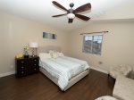 Master bedroom w/ king size bed and large screen HDTV